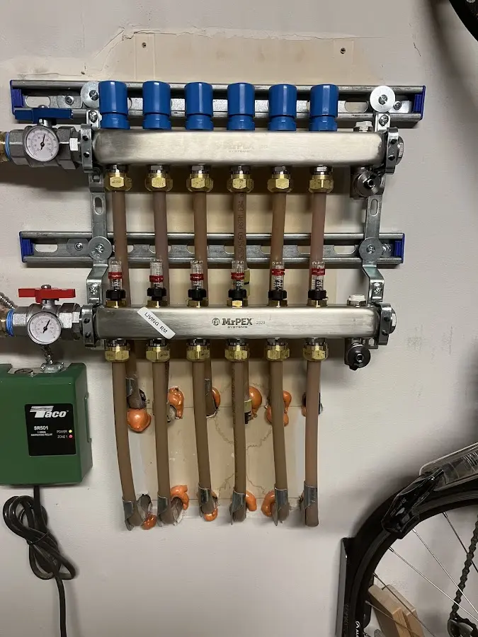 Plumber performing Sink Repair at a residential property in Camden